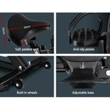 Exercise bike features soft padded seat, anti-slip pedals, built-in wheels, adjustable base.
