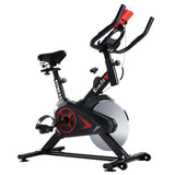 Black and red Everfit indoor exercise bike with adjustable seat and handlebars
