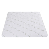 White bamboo mattress topper with subtle green bamboo print, breathable bedding accessory