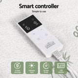 Smart controller for electric blanket with LED display, timer, and heat settings on a fabric surface