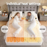 Couple sleeping on electric heated mattress pad with dual individual heat settings in bedroom.
