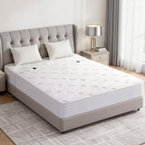 Bamboo fabric electric mattress protector on a modern queen bed in a bright bedroom