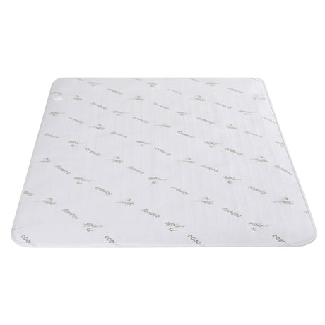 White bamboo mattress topper with green bamboo pattern on plain background