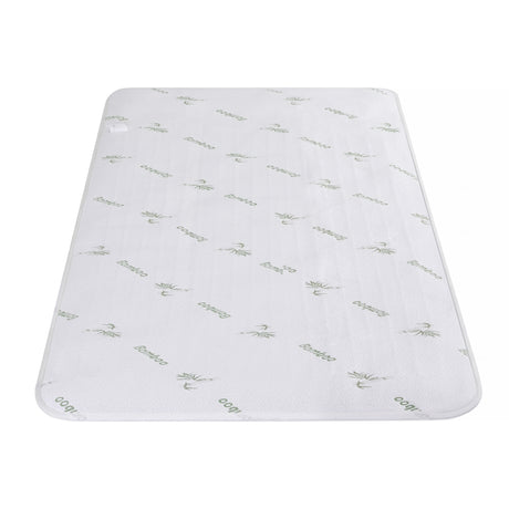 White bamboo mattress topper with green bamboo text and leaf pattern on a plain background