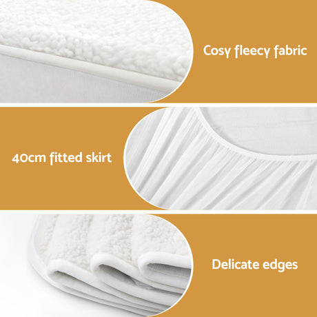 White fitted mattress protector with fleecy fabric, 40cm skirt, and delicate edges.