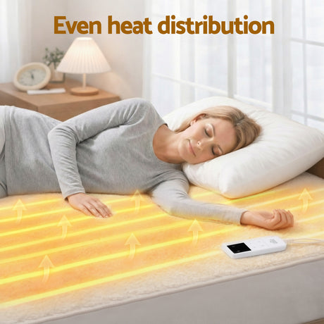 Woman sleeping on heated electric mattress pad with remote control, even heat distribution