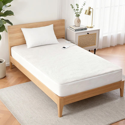 Single wooden bed with white mattress and pillow, electric blanket controller on bed
