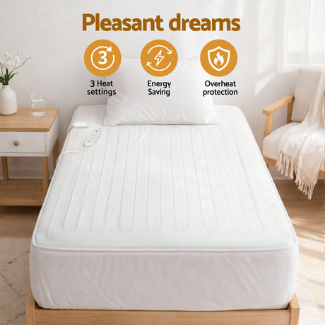Electric heated mattress topper on bed with remote, three heat settings, energy-saving, overheat protection.