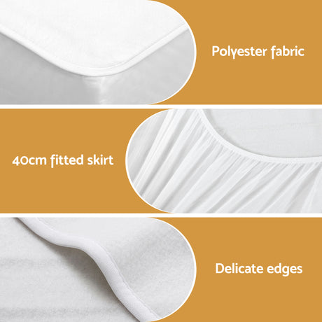 White polyester mattress cover with 40cm fitted skirt and delicate edges, close-up view