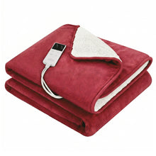 Folded red electric heated throw blanket with white sherpa lining and remote control