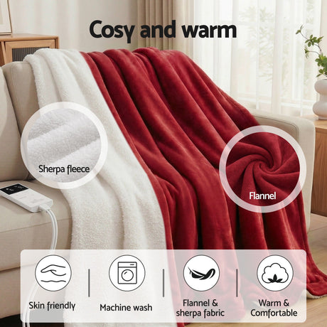 Red and white sherpa fleece and flannel throw rug on beige sofa, cozy and machine washable.