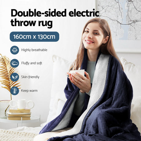 Woman enjoying a navy double-sided electric throw rug, fluffy, skin-friendly, 160x130cm.