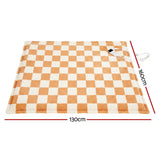 Orange and white checkered heated throw rug, 130cm by 160cm, with attached controller.