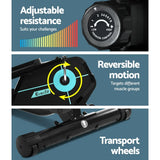 Exercise machine features adjustable resistance, reversible motion, and transport wheels.