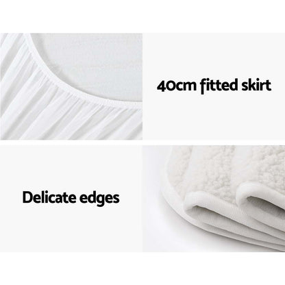 White fitted mattress protector with 40cm skirt and soft, delicate edges