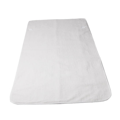 white rectangular change mat with corner straps on plain background