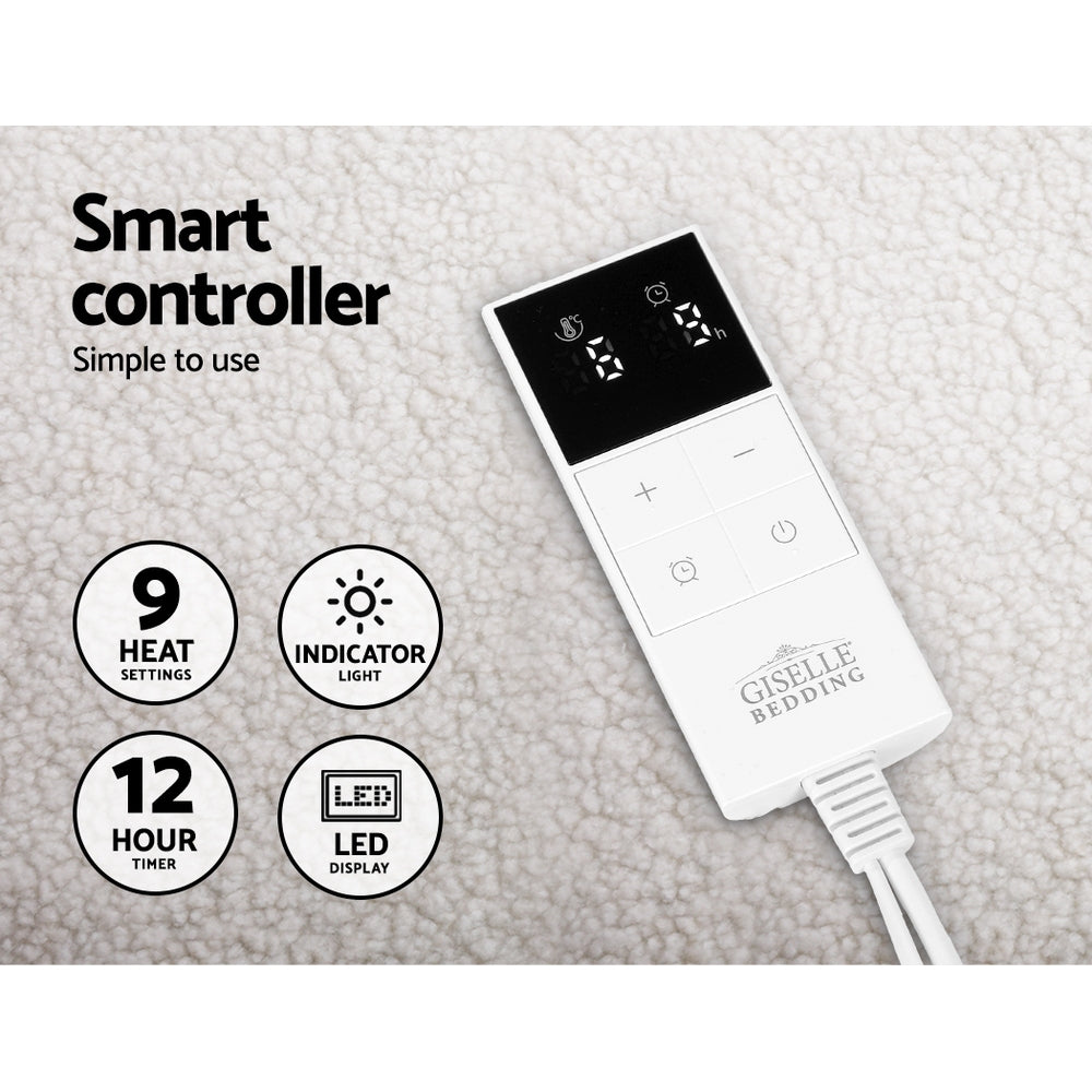 Electric blanket controller with LED display, 9 heat settings, timer, and indicator light on fleece fabric.