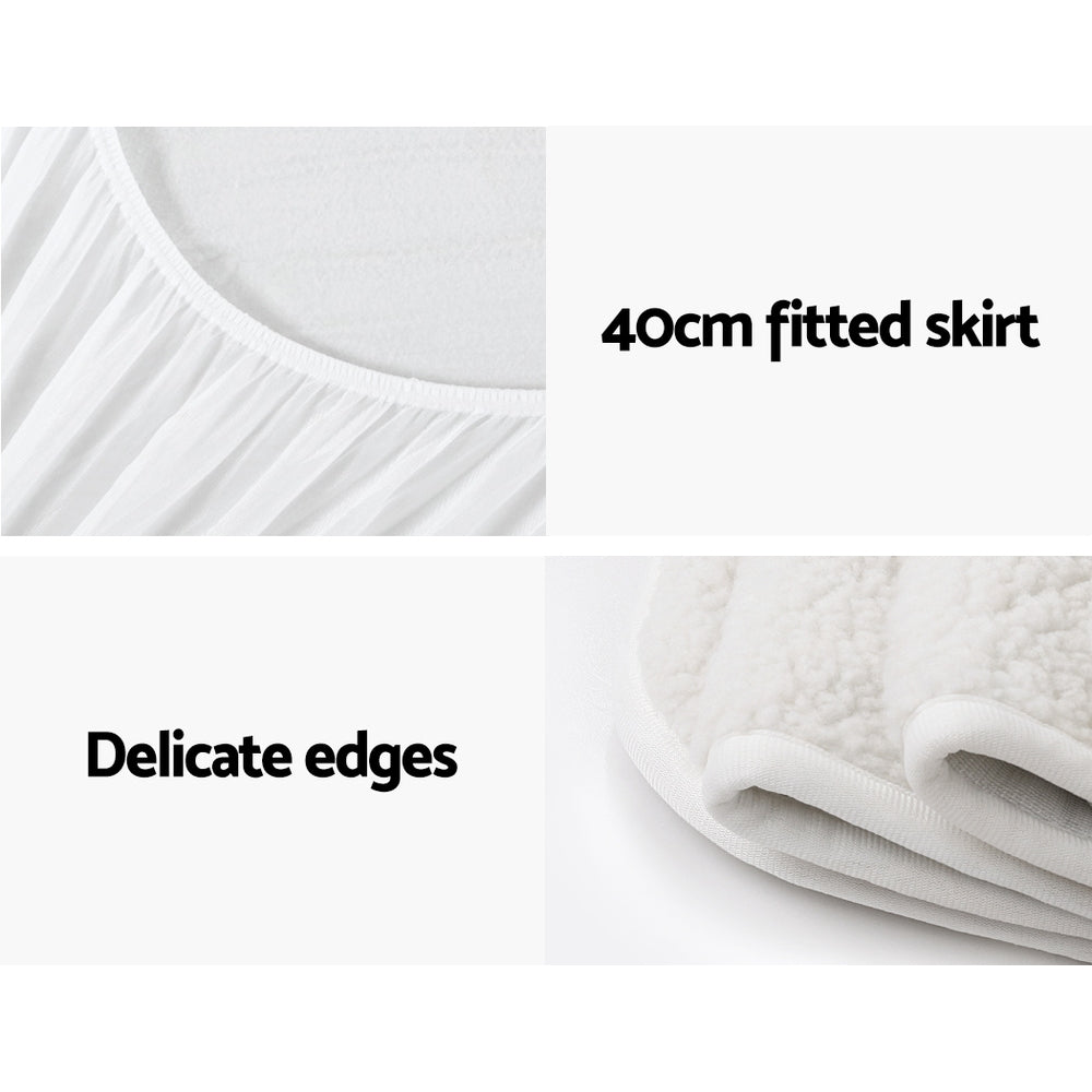 White mattress protector with 40cm fitted skirt and soft, delicate edges
