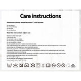 Care instructions label for electric blanket with laundry and safety symbols.