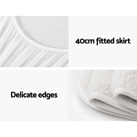 White fitted mattress protector with 40cm skirt and soft, delicate edges
