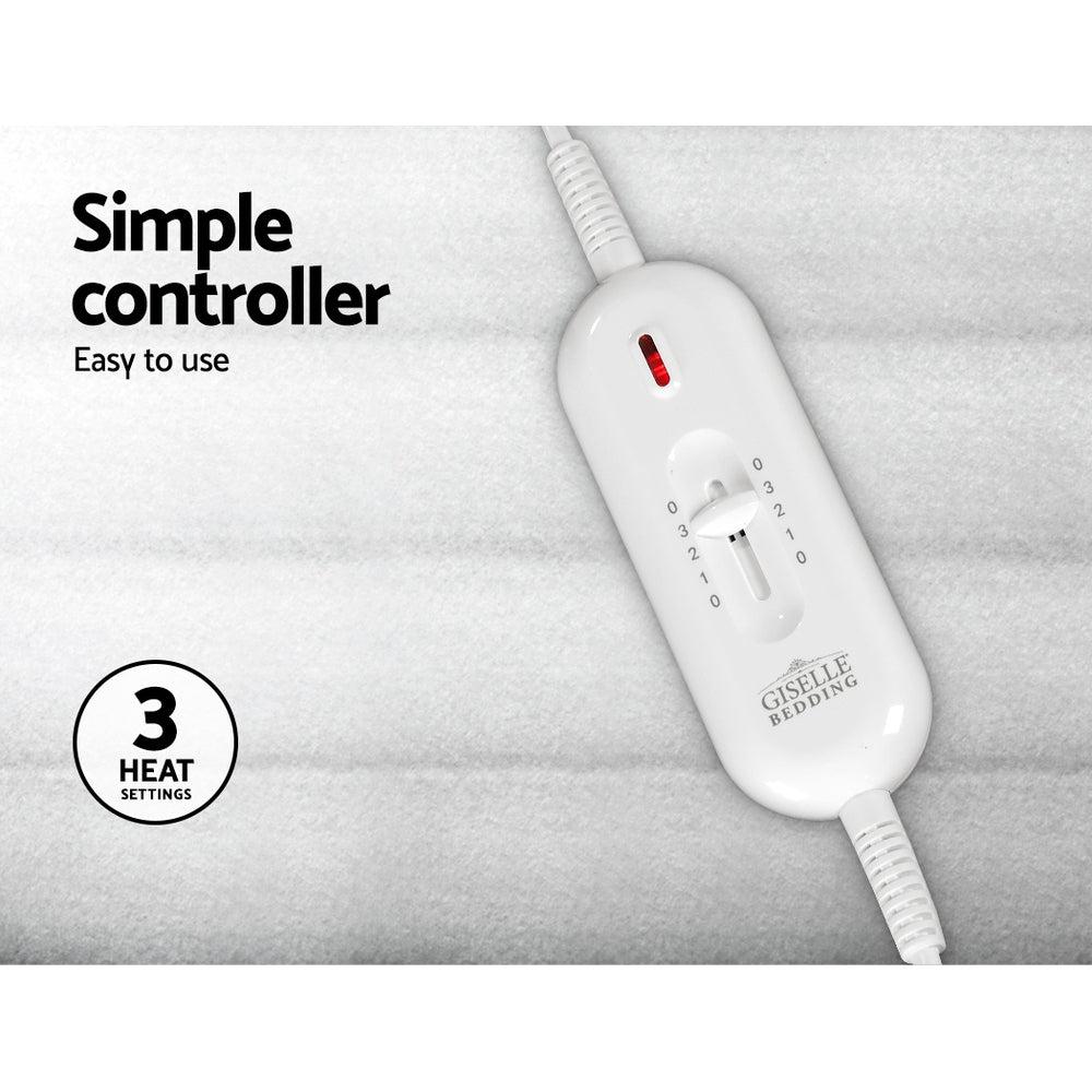 Electric blanket controller with three heat settings on a white quilted fabric surface