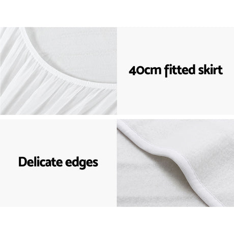 White mattress cover with 40cm fitted skirt and delicate edges, close-up details shown.