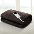 Dark grey electric heated blanket with digital controller on a light surface
