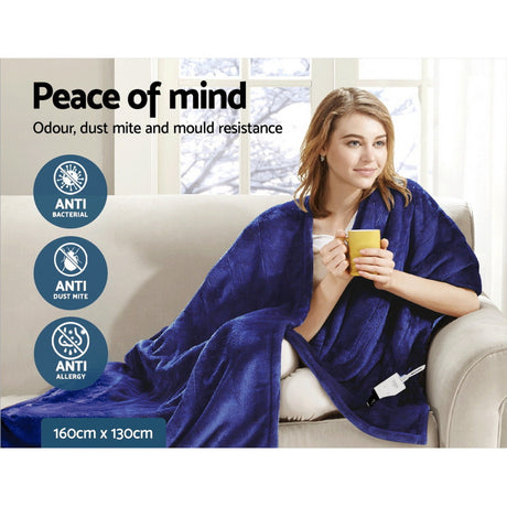 Woman sitting on sofa with blue antibacterial throw rug, holding mug, product size 160x130cm