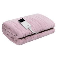 Pink electric heated throw blanket with remote control on white background