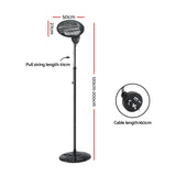 Black electric standing heater with pull cord, adjustable height, and measurement labels