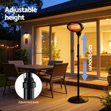 Outdoor electric patio heater with adjustable height, black stand, and adjustment knob on a deck