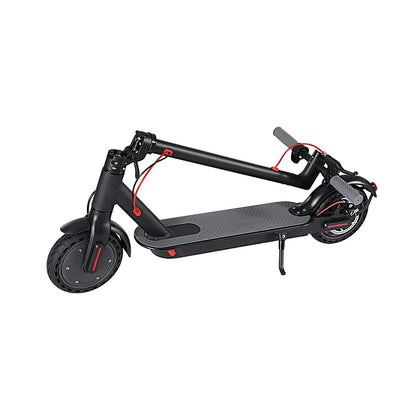 Foldable black electric scooter with red accents, kickstand, and textured foot deck