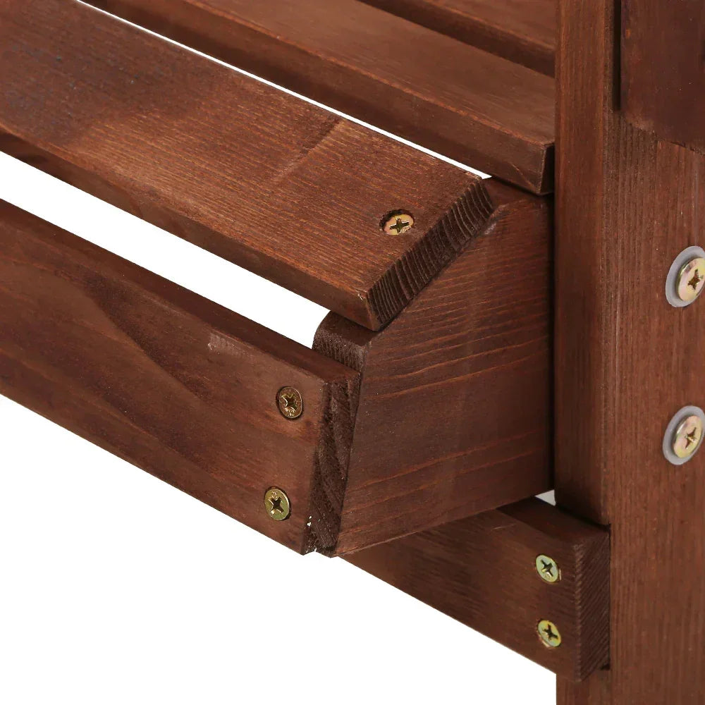 Close-up of brown wooden slats and screws on an outdoor furniture frame