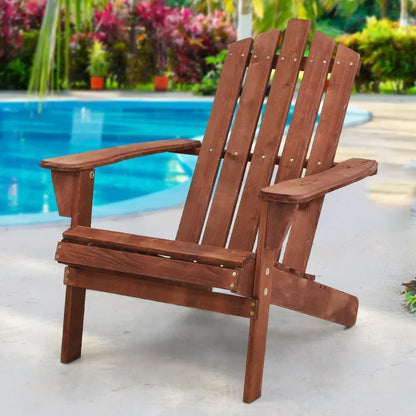 Wooden Adirondack chair by a poolside with tropical garden background