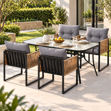 Gardeon 5 piece outdoor dining set with a 140cm tempered glass table and four wicker chairs in black