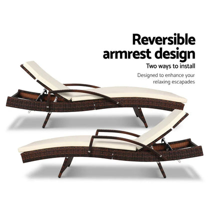 Outdoor lounge chair with reversible armrest and adjustable reclining positions, wicker frame, cream cushion.