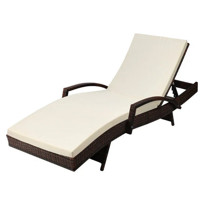 Outdoor wicker lounge chair with cream cushion and adjustable backrest