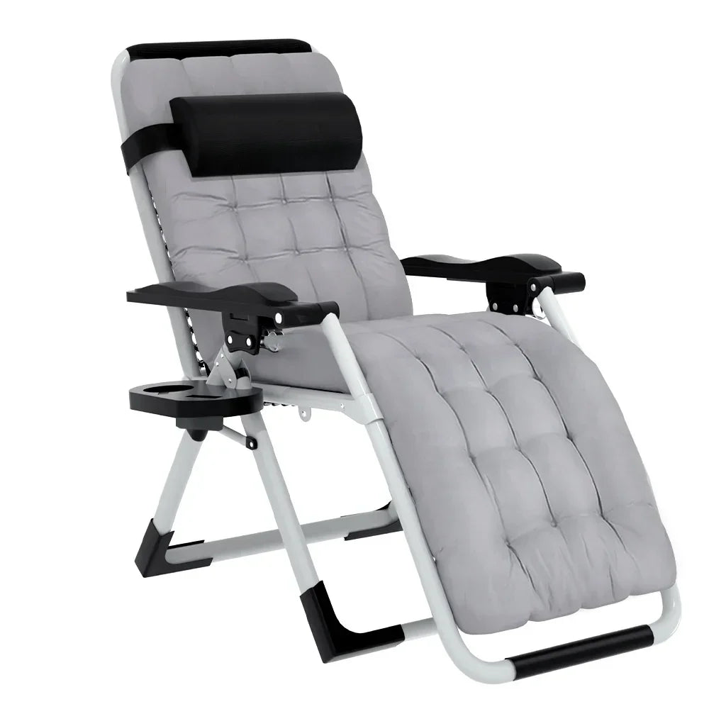 Reclining lounge chair with padded grey cushion, cup holder, and black headrest