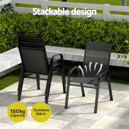 Outdoor stackable black dining chairs with textilene fabric and 150kg capacity on patio