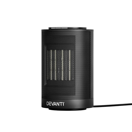 Black ceramic electric heater with front mesh grille and power cord, compact tabletop design