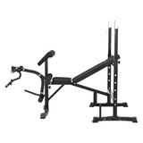 Black weight bench with adjustable backrest and leg developer for home gym workouts