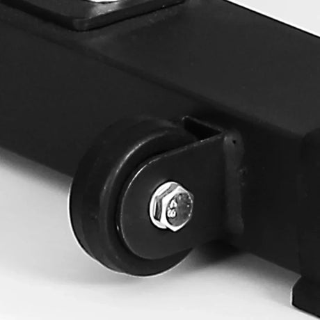 Close-up of a black adjustable weight bench wheel with bolt on metal frame