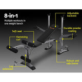 Multi-function weight bench with adjustable backrest, leg extension, and hamstring curl features.