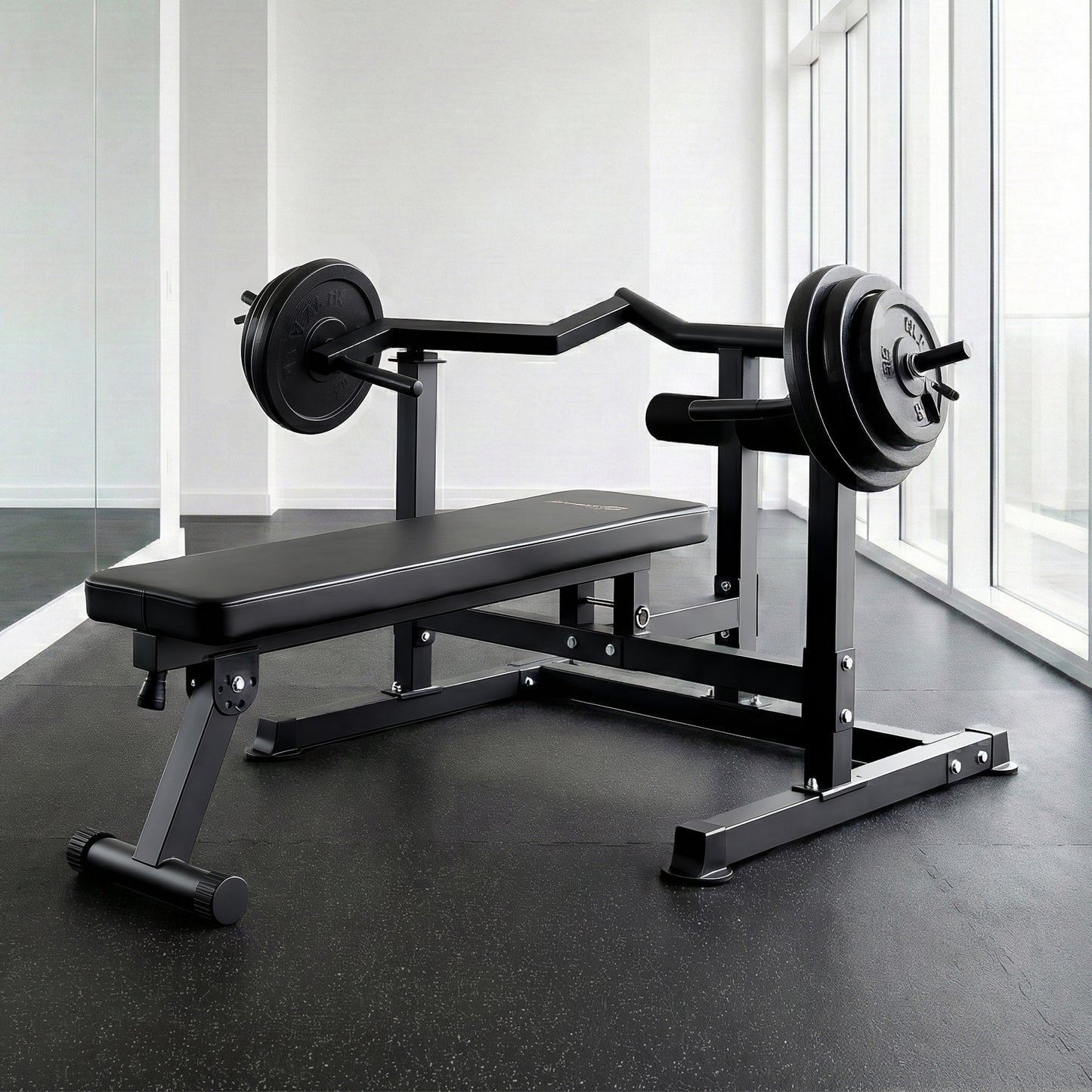 Black weight bench with barbell and weights for home gym strength training