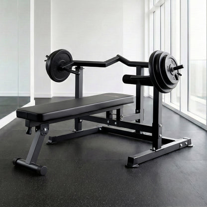 Black weight bench with barbell and weights for home gym strength training