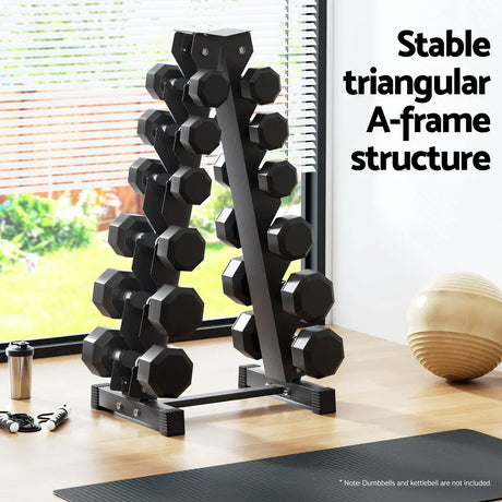 Black A-frame dumbbell rack with hex weights in a home gym setting, sunlight through window