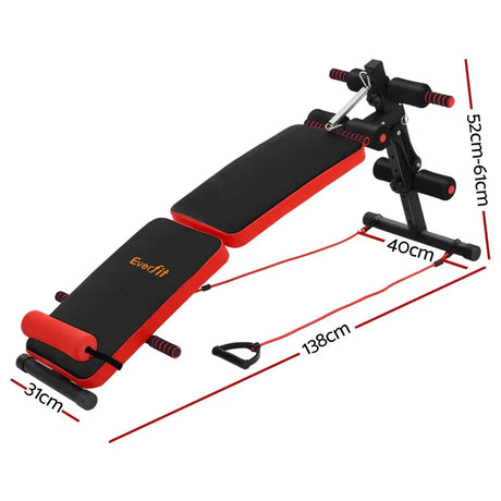 Adjustable sit-up bench with red and black padding, resistance bands, and size measurements.
