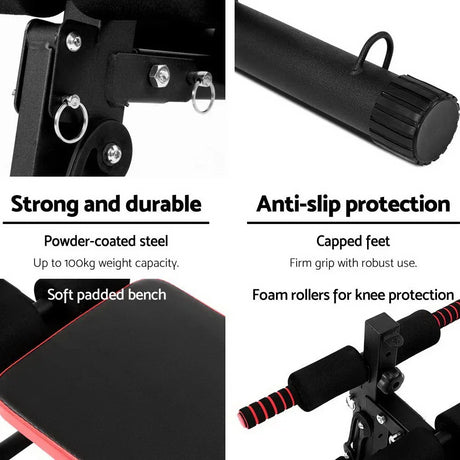 Black sit up bench with padded seat, foam rollers, powder-coated steel, and capped feet.