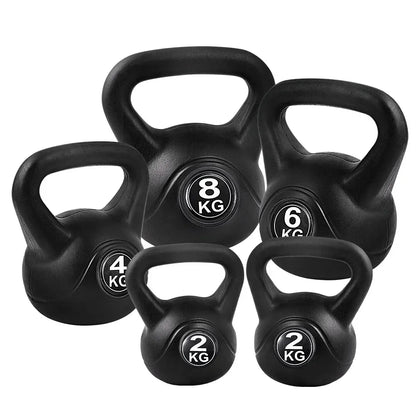 Set of black kettlebells with 2kg, 4kg, 6kg, and 8kg weights, arranged on white background