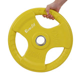 Yellow 20kg Everfit weight plate with hand grip, held by a person